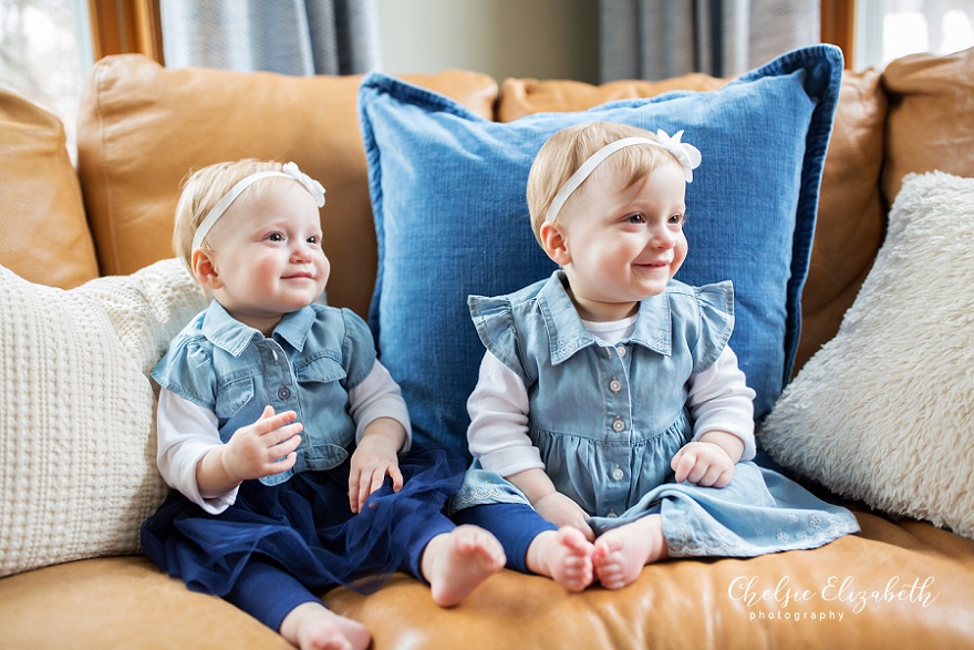 twin sisters sitting for photo session