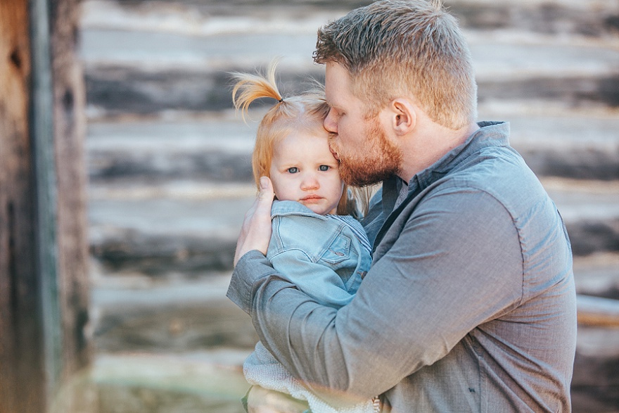 daddy holding daughter sweet photo