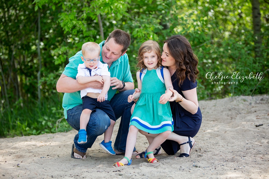 candid photo of family on beach