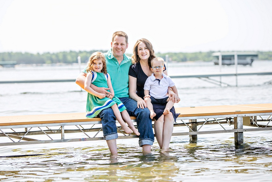 family of 4 on the dock on Pelican Lake