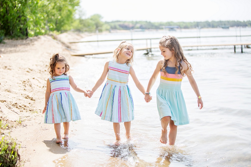 sisters on the shoreline Pelican Lake