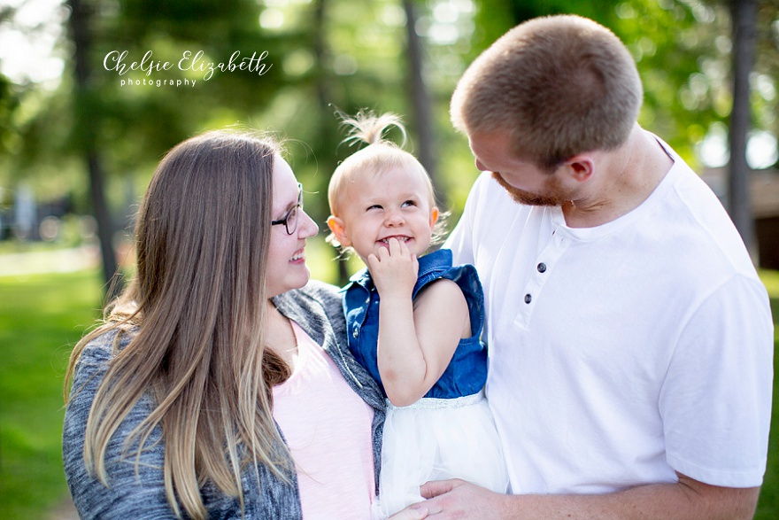 little girl with parents