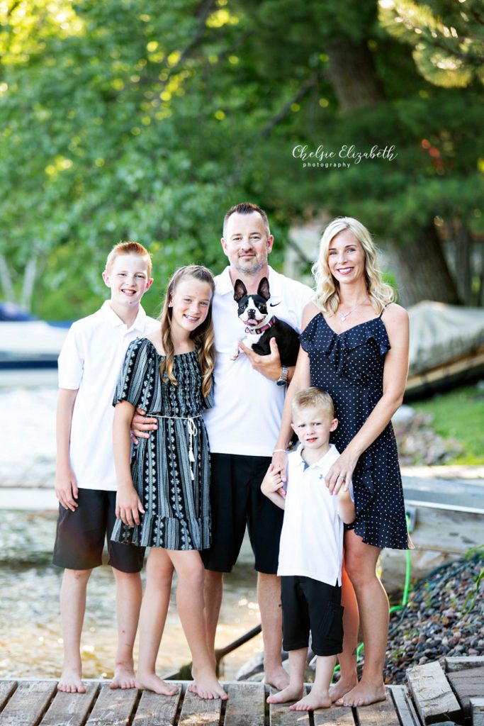 family of 5 on a dock