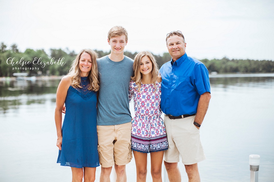 family of 4 on a dock