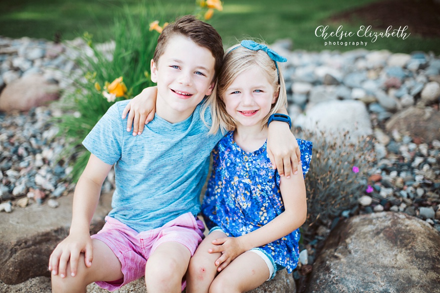 brother and sister portrait on beach