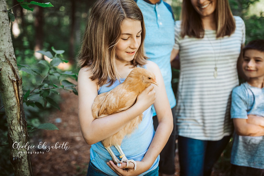 little girl and her chicken