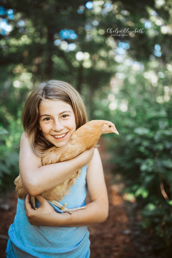 little girl and her chicken