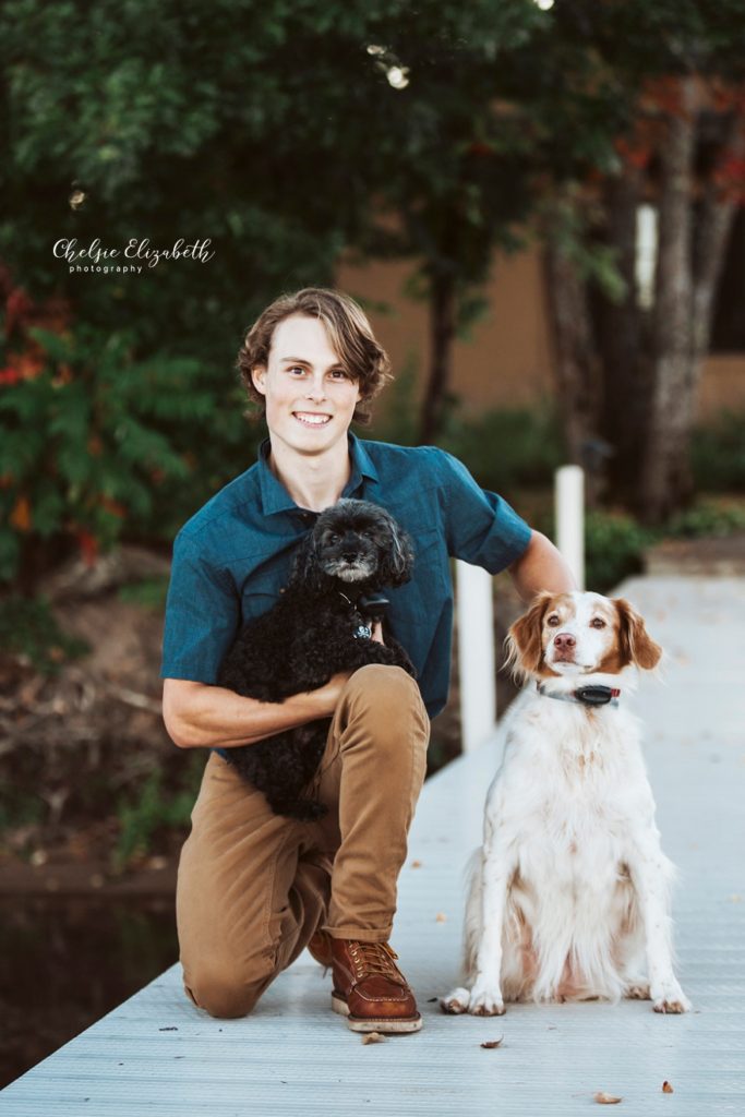 senior photo with dogs