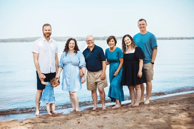 Boyd Lodge family photo session during summer vacation in Crosslake MN. The family is on the beach of Lower Whitefish Lake