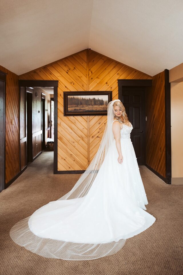 a solo photo of a beautiful bride getting ready for her wedding at Grand View Lodge in Nisswa MN