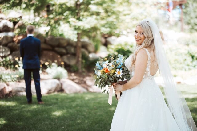 a bride and groom before their first look