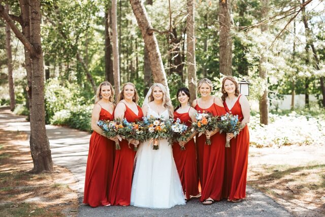 bridemaids with the bride in a forest setting at grand view lodge