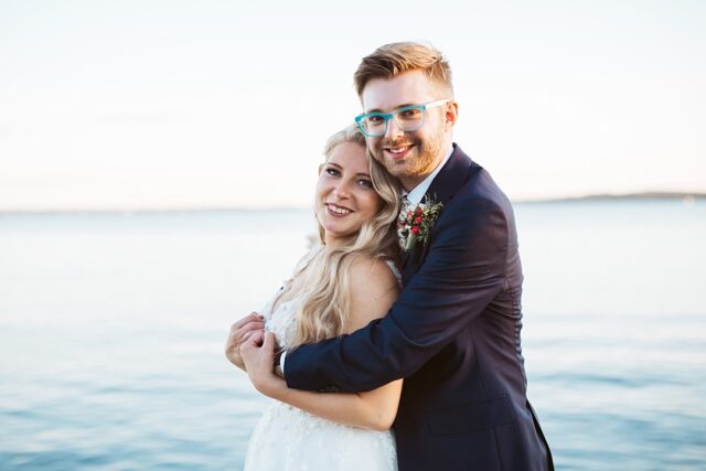 a wedding portrait on the dock at Grand View Lodge